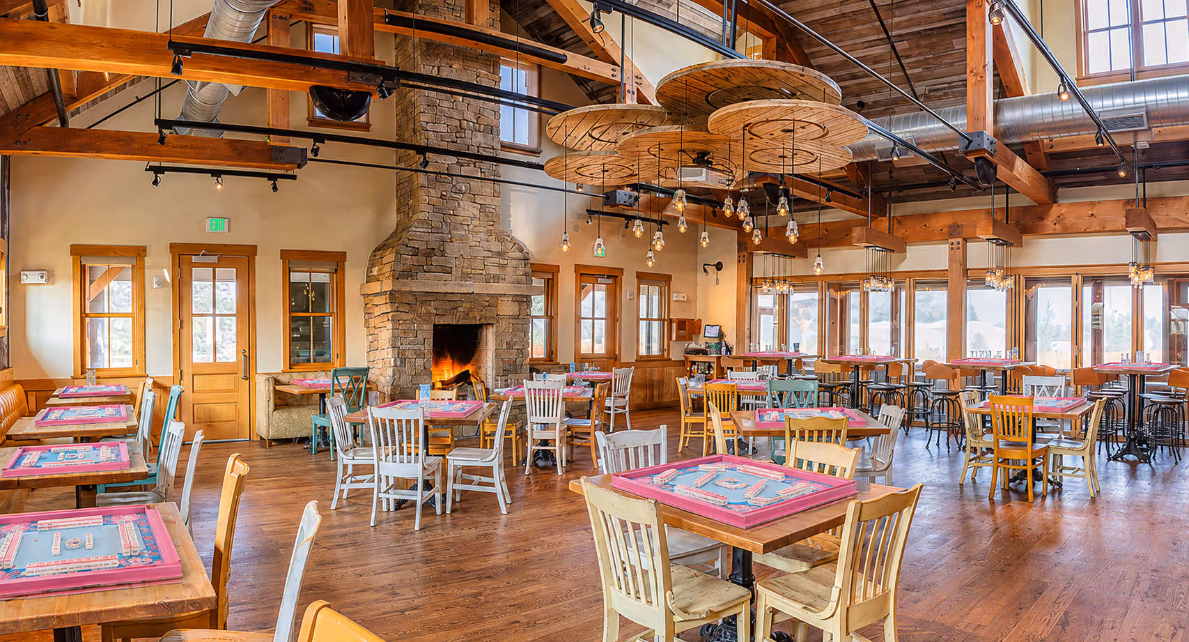 The warm, fireplace-lit North room at Breckenridge Brewery in Littleton, the setting for the October 28 open play evening
