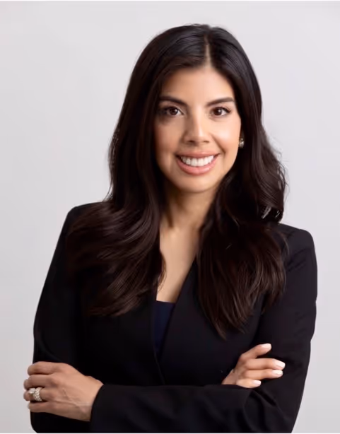 Mishelle Meyer, founder of Mishelle Meyer Homes, smiling warmly in a professional portrait
